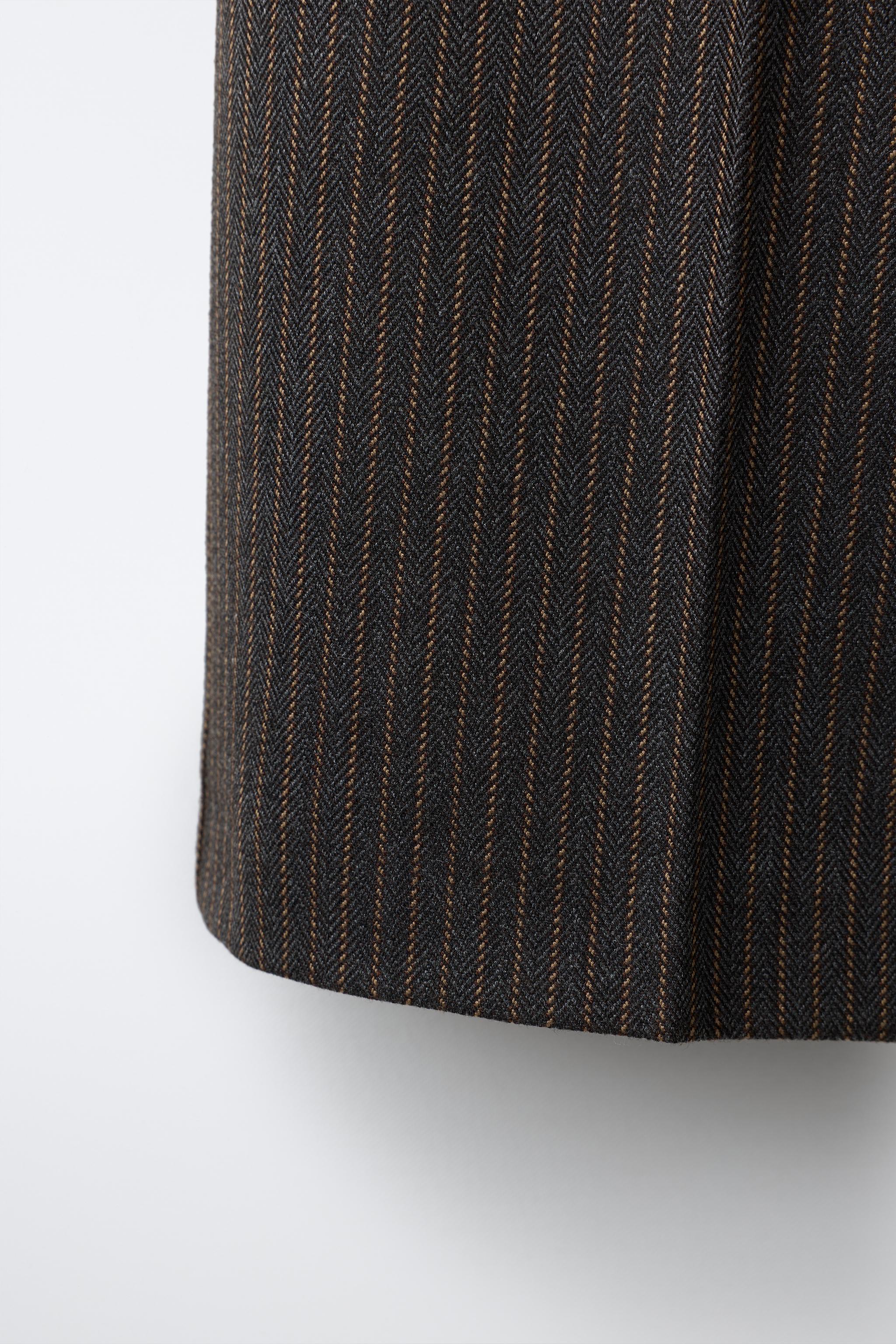 PANTALON À JAMBES LARGES RAYURES ET DOUBLE CEINTURE